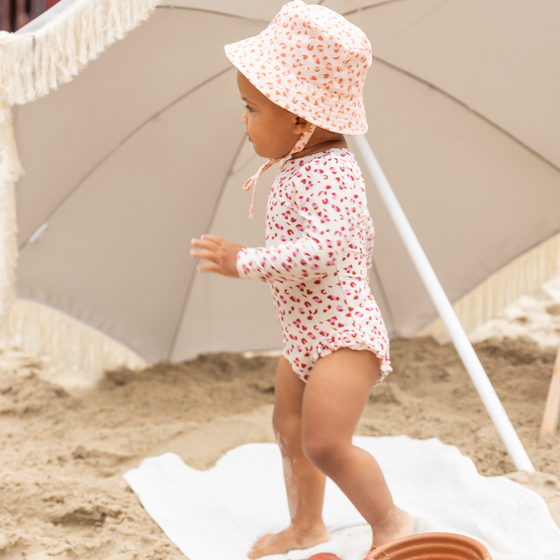 Pastel pink leopard print Swimsuit girl long sleeves by Swim Essentials