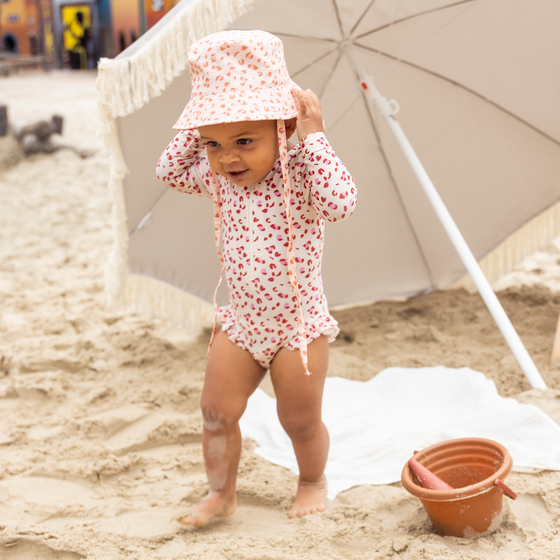 Pastel pink leopard print Swimsuit girl long sleeves by Swim Essentials